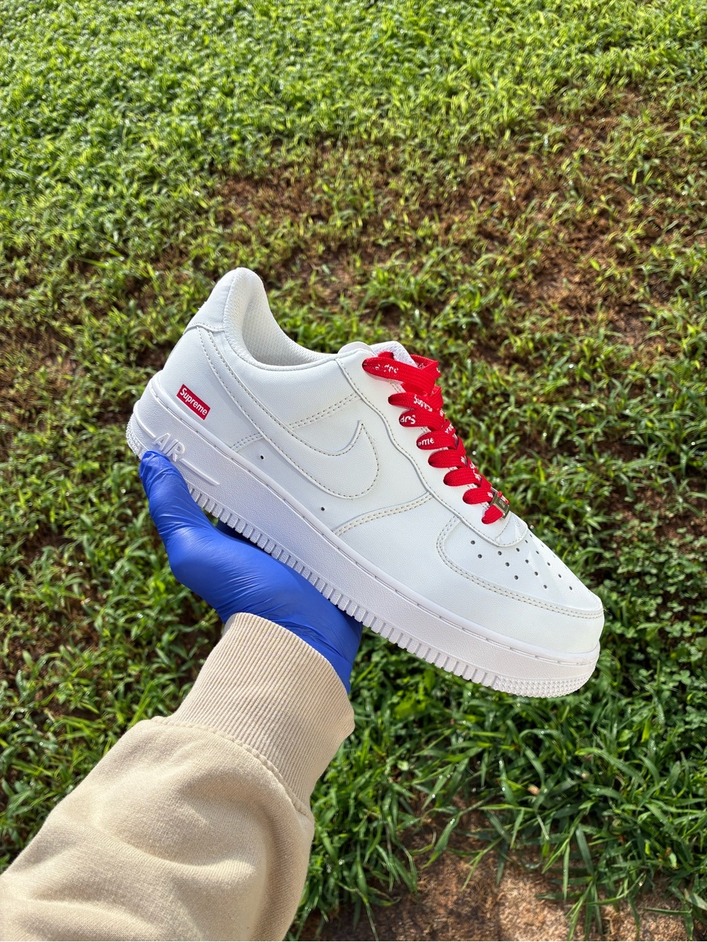 Nike White Leather Sneakers with Red Laces
